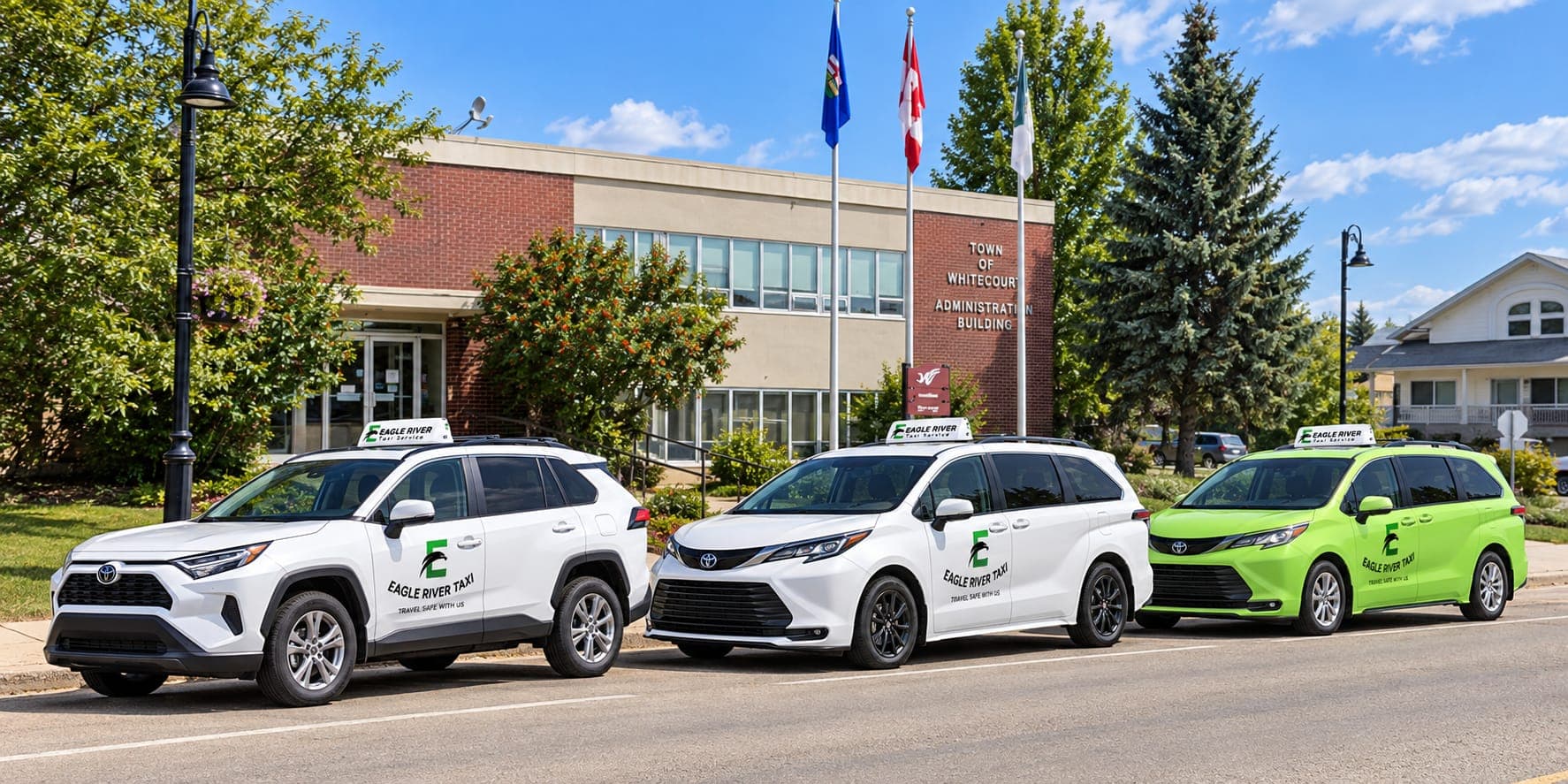 White and green Eagle River Cabs vehicles in Whitecourt.