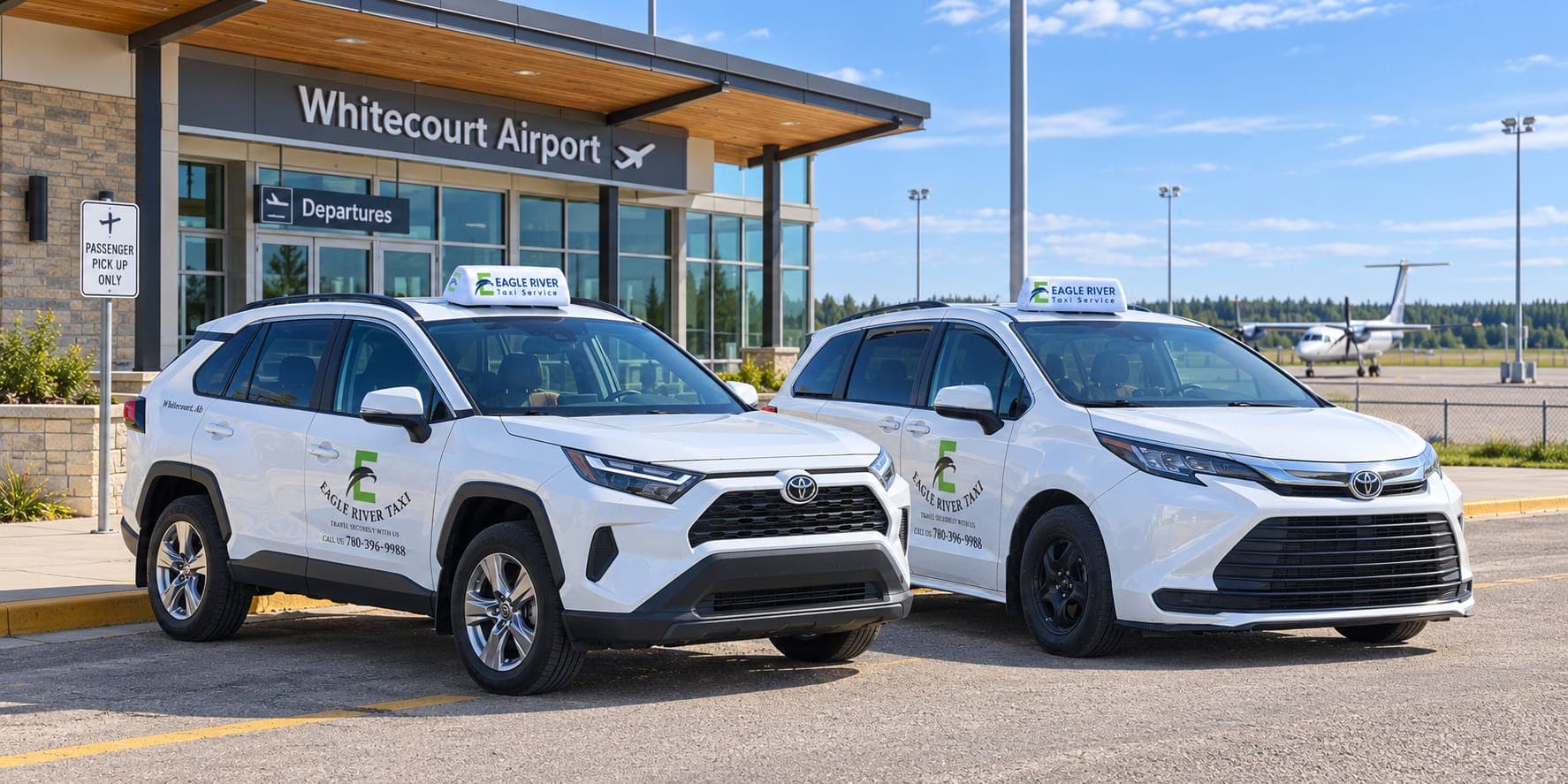 Two branded Eagle River Cabs vehicles outside Whitecourt Airport.